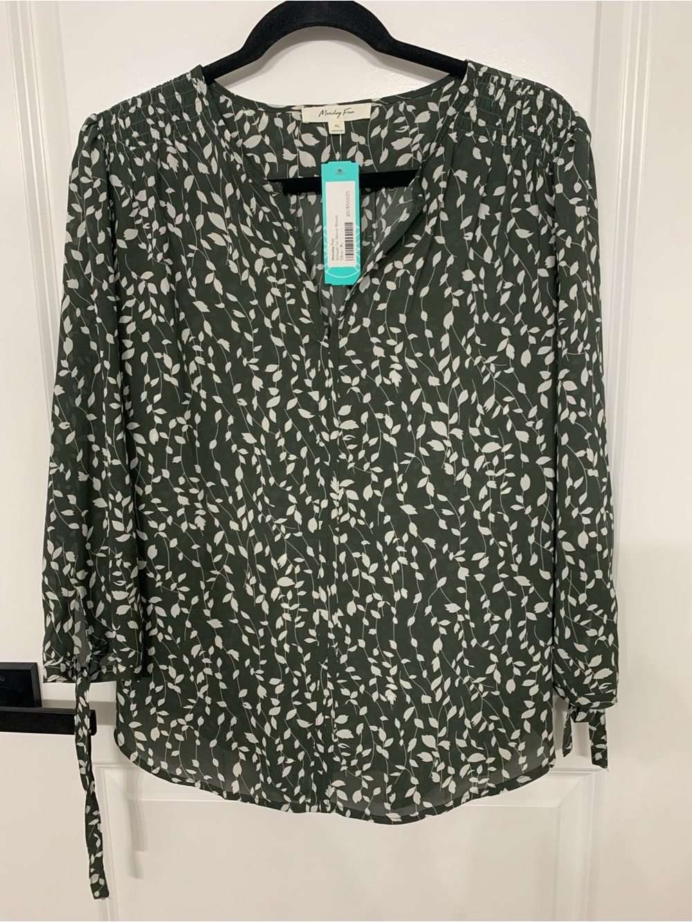 Leaf-Print Olive V-Neck Blouse with Tie Cuffs